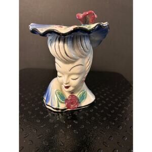 vintage lady head vase - a stylish lady in a blue hat adorned with a red rose.